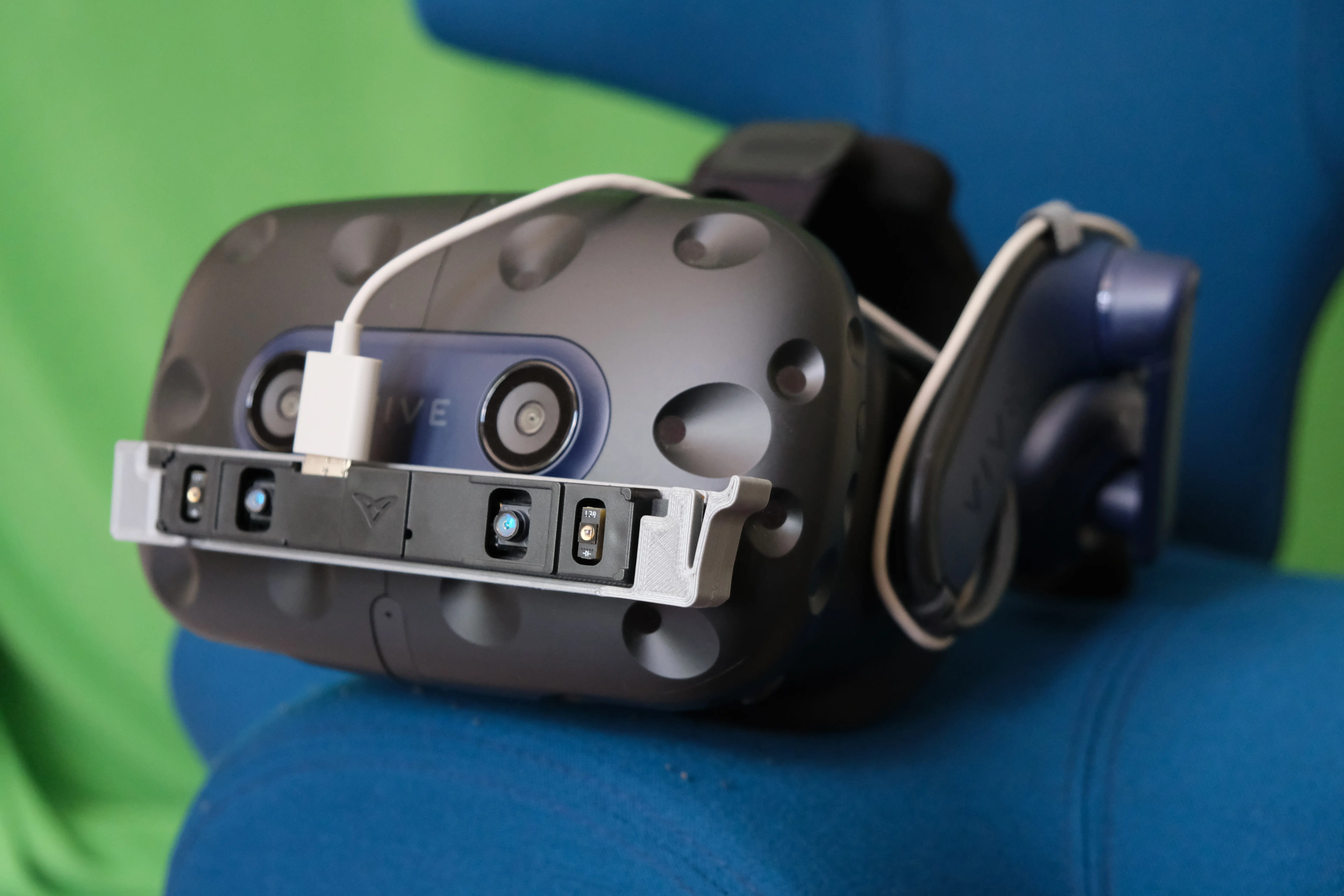 An HTC Vive with a Leap Motion Stereo IR 170 attached to the front.